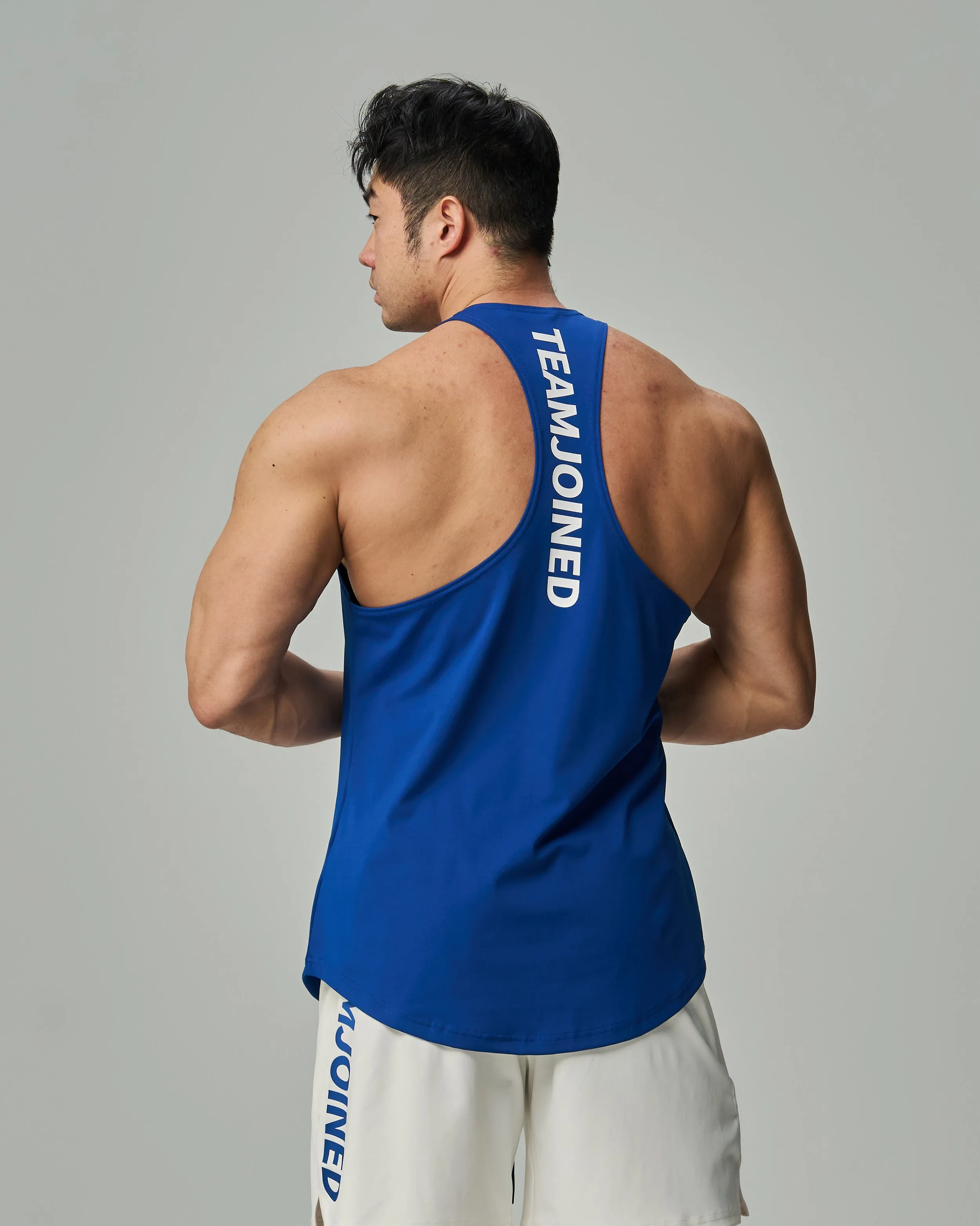 Adapt Spine logo Muscle Stringer