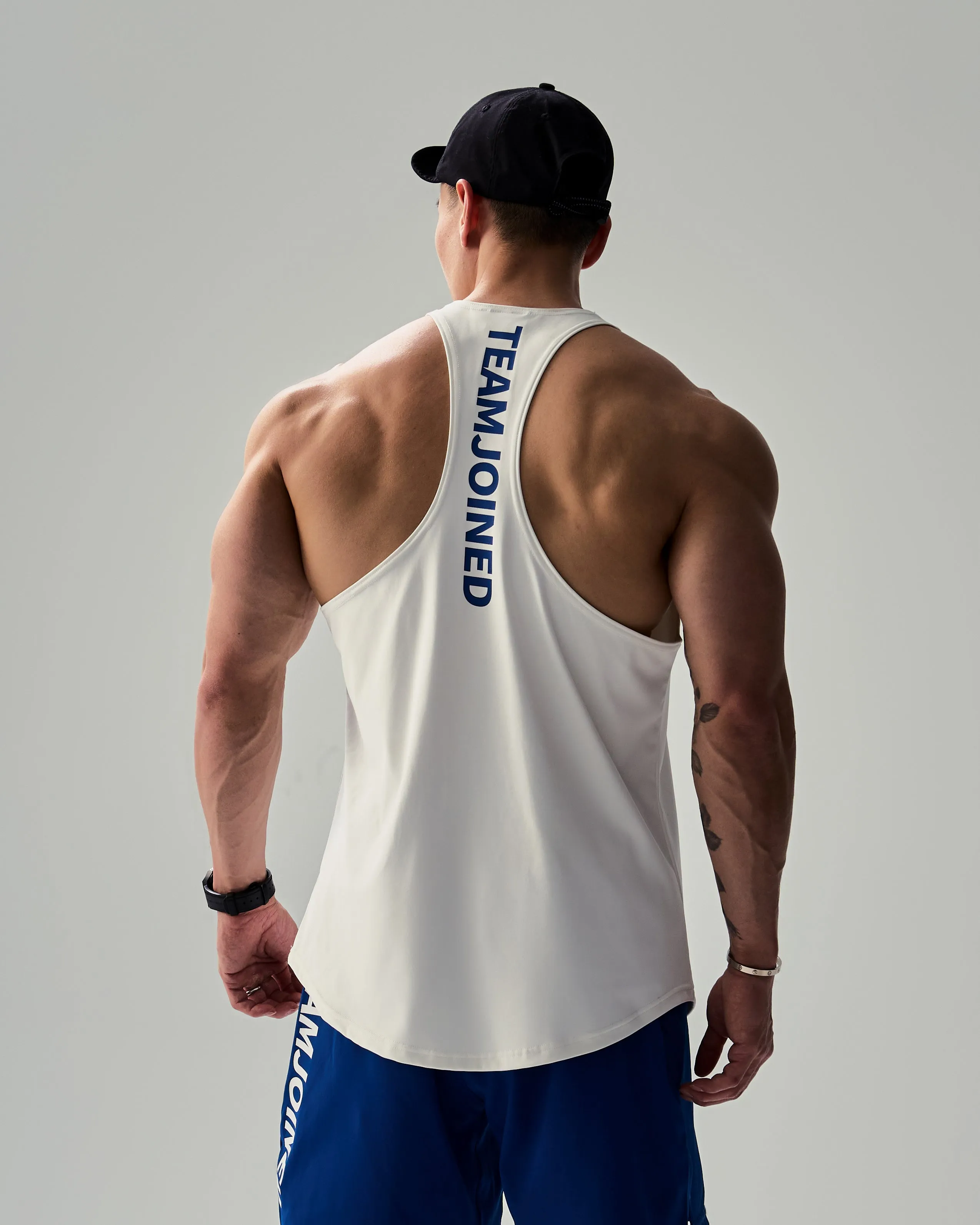 Adapt Spine logo Muscle Stringer