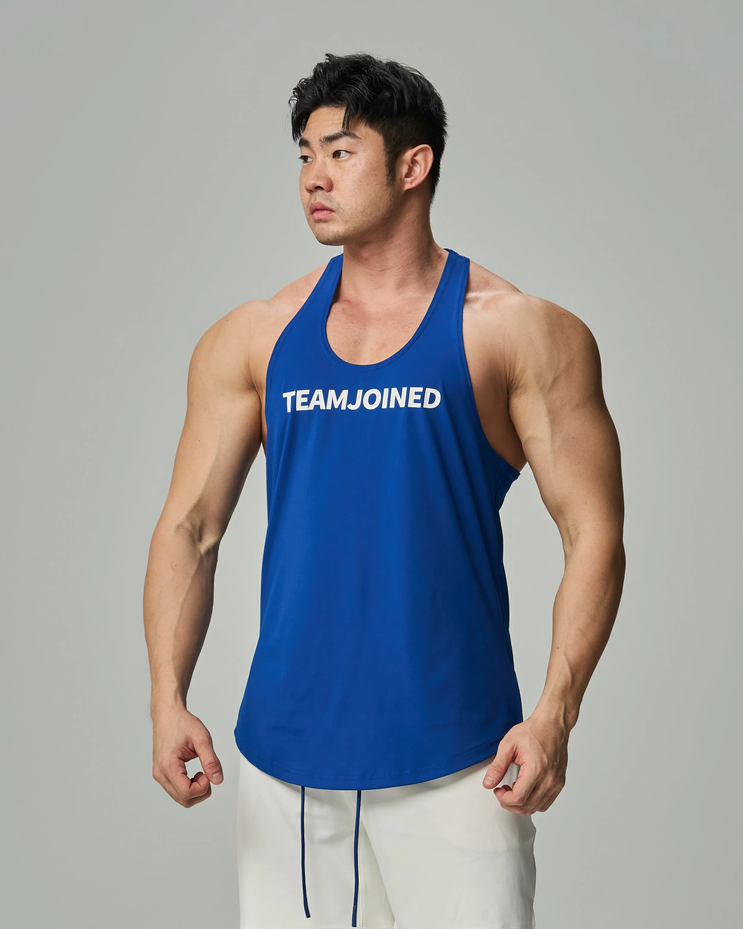 Adapt Spine logo Muscle Stringer