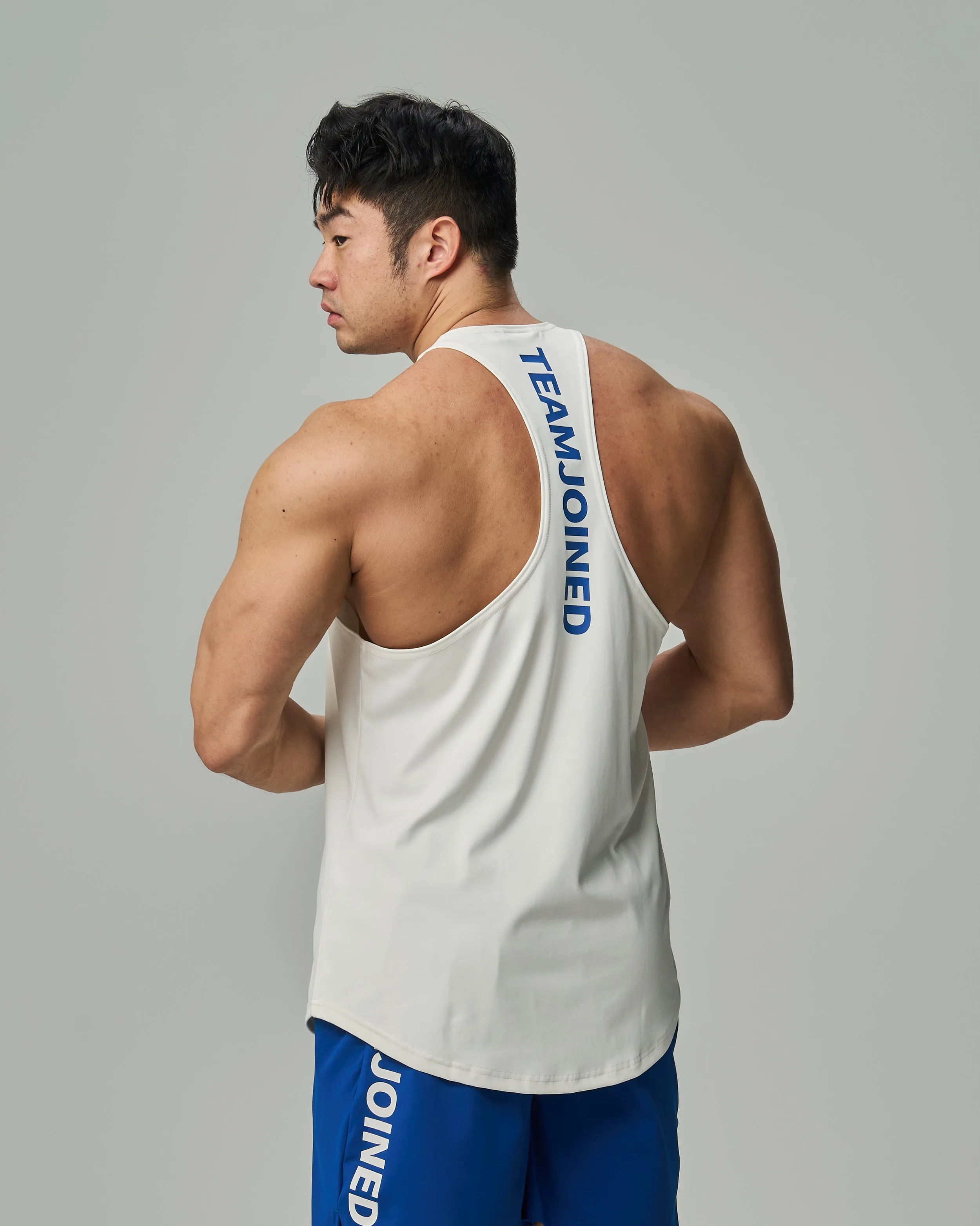 Adapt Spine logo Muscle Stringer