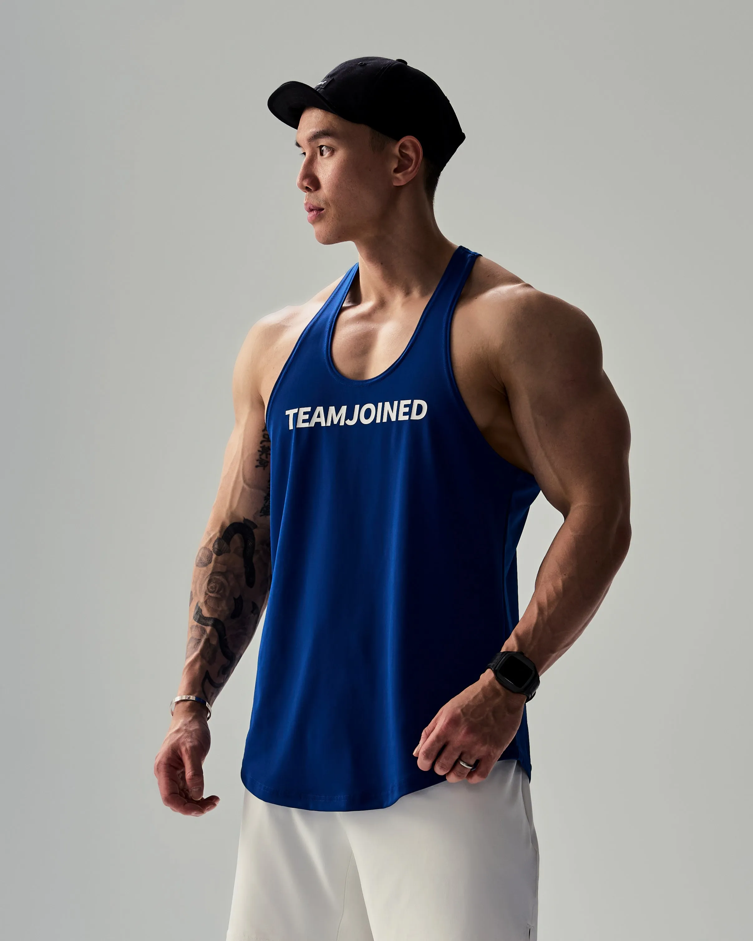 Adapt Spine logo Muscle Stringer