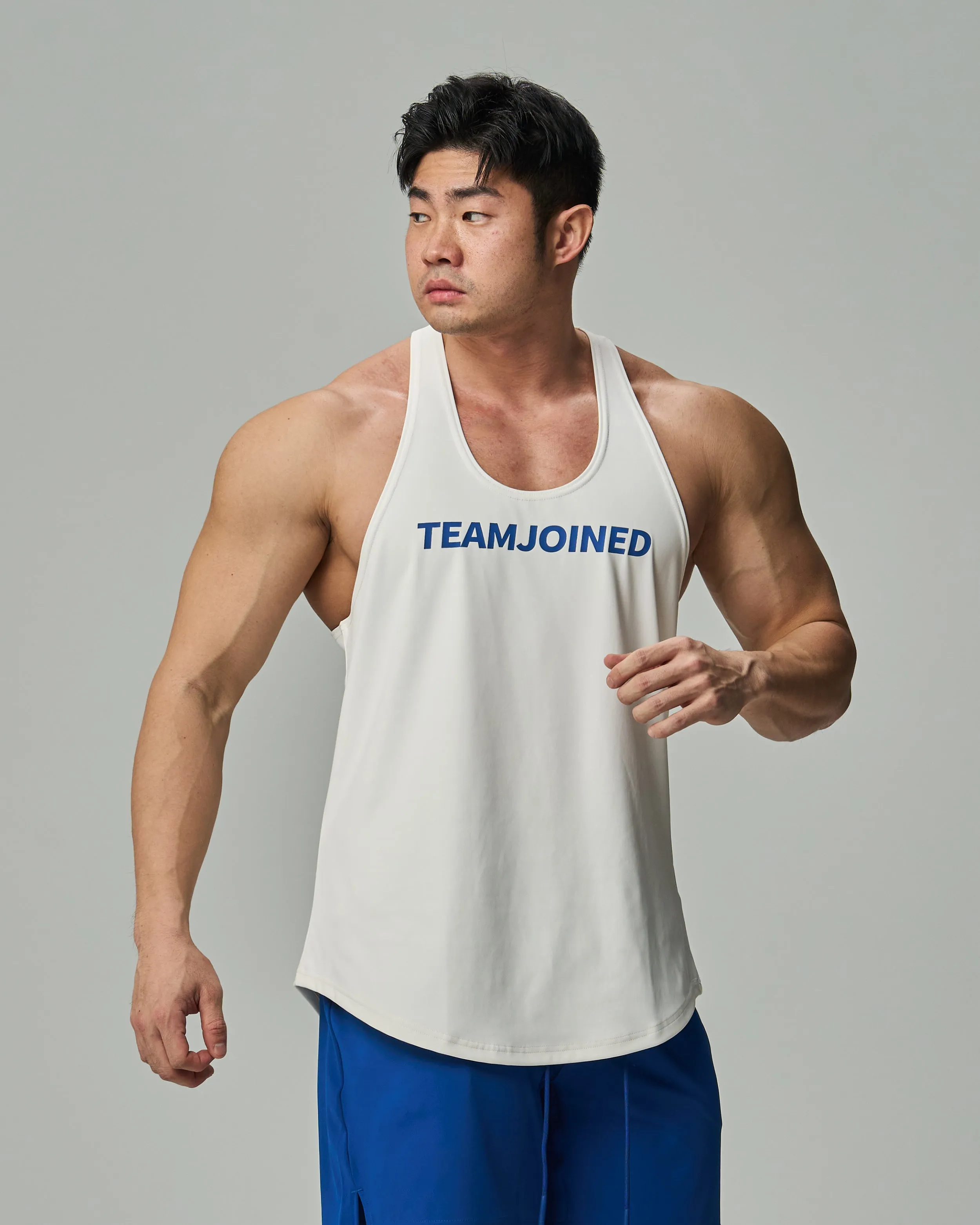 Adapt Spine logo Muscle Stringer